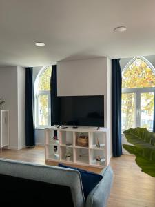 TV a/nebo společenská místnost v ubytování A Casa da Praça - The Square House