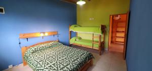 Ένα ή περισσότερα κρεβάτια σε δωμάτιο στο Medanos Talas Sur