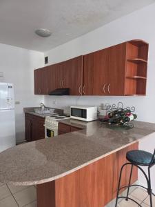 Η κουζίνα ή μικρή κουζίνα στο aparhotel 1309