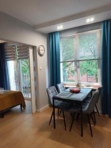 Postel nebo postele na pokoji v ubytování Centrum Apartment na Zamenhofa