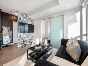 Khu vực ghế ngồi tại The Essery Suites - Downtown Entertainment District Toronto