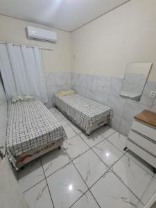 Ένα ή περισσότερα κρεβάτια σε δωμάτιο στο Elite Hotel Prime