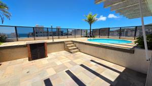 Hồ bơi trong/gần Cobertura 5 quartos sendo 4 suites , piscina churrasqueira , Pitangueiras , 4 vagas