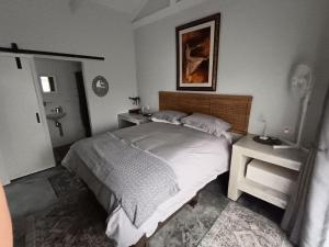 En eller flere senge i et værelse på 66onjennings Strand