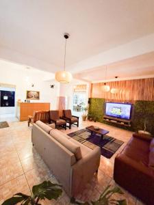 Μια τηλεόραση ή/και κέντρο ψυχαγωγίας στο Pousada Parada Da Fe1