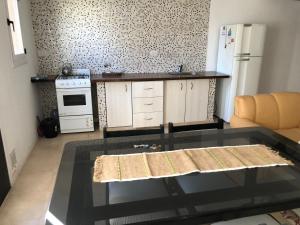Kuchyň nebo kuchyňský kout v ubytování Duplex 101 Parque Necochea