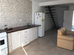 Kuchyň nebo kuchyňský kout v ubytování Duplex 101 Parque Necochea