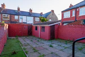 El edificio en el que está la casa vacacional