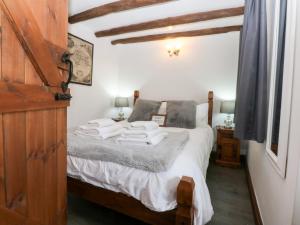 Voodi või voodid majutusasutuse Ty'n-Y-Ffynnon Cottage toas