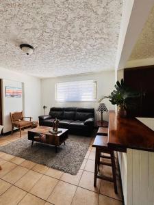 Posezení v ubytování Bonsai House