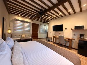 TV a/nebo společenská místnost v ubytování Hotel Arista 1026