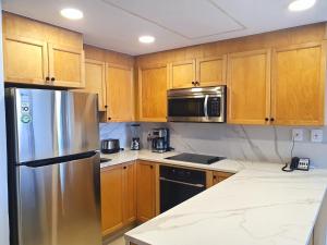 Kuchyň nebo kuchyňský kout v ubytování Paradise Village