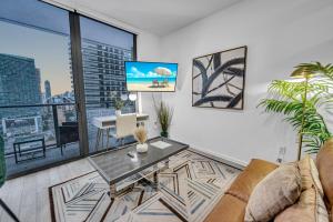 a living room with a view of a city at Modern Studio City Views in Miami