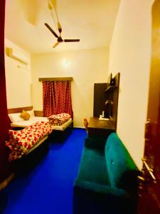 Postel nebo postele na pokoji v ubytování Hotel MAQ Lumbini