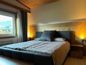 Postel nebo postele na pokoji v ubytování Cozy holiday home with mountain views