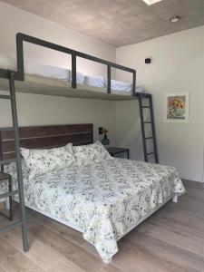 Ένα ή περισσότερα κρεβάτια σε δωμάτιο στο Casa de Campo en Cieneguilla