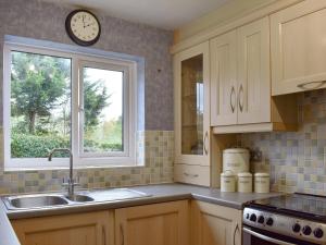 Køkken eller tekøkken på Flo's Place + 11 billeder