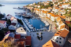 an aerial view of a harbor with boats in the water at Apartments by the sea Stomorska, Solta - 13695 in Stomorska