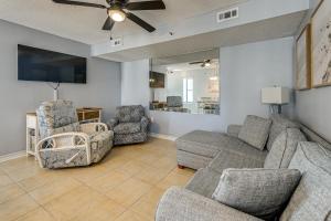 a living room with a couch and two chairs at Ocean-View Penthouse Condo in North Myrtle Beach! in Myrtle Beach