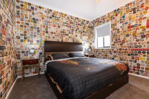 Ένα ή περισσότερα κρεβάτια σε δωμάτιο στο Spacious Central Stay on Olive