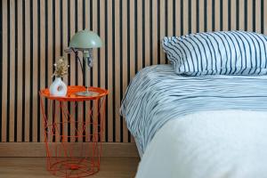 Ένα ή περισσότερα κρεβάτια σε δωμάτιο στο Duplex Cosy - Moderne - 15min Versailles