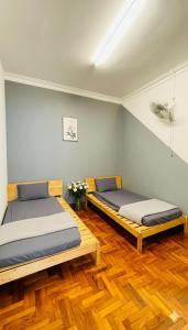 Ένα ή περισσότερα κρεβάτια σε δωμάτιο στο Gathering Rinting Masai Semi-D 6BR 20 Pax Game