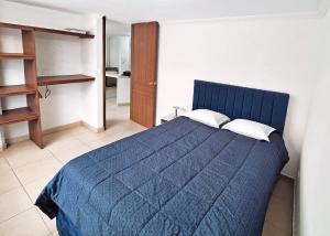 Ένα ή περισσότερα κρεβάτια σε δωμάτιο στο Apartamentos San Pedro +7 φωτογραφίες