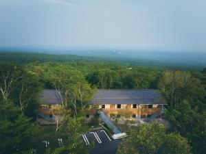 an overhead view of a house in the middle of a forest at SANU 2nd Home Nasu 3rd in Nasu
