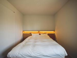 Ένα ή περισσότερα κρεβάτια σε δωμάτιο στο SANU 2nd Home Nasu 3rd