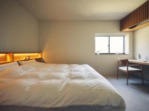 Ένα ή περισσότερα κρεβάτια σε δωμάτιο στο SANU 2nd Home Nasu 3rd