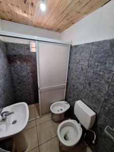 Et badeværelse på Depto colonia caroya