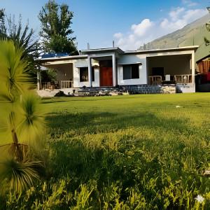 Сад в Country Club Resorts - Riverside Cottages & Suites