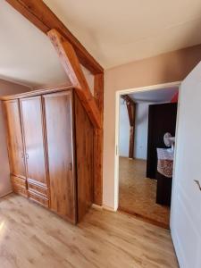 Postel nebo postele na pokoji v ubytování Dom Gościny Jaś i Małgosia