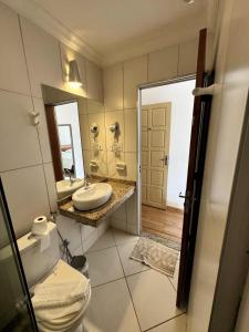 Et badeværelse på Imperial Cidade Smart Suítes