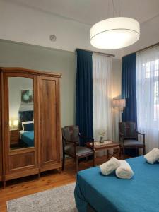 Ένα ή περισσότερα κρεβάτια σε δωμάτιο στο Λίθινο Ληθαίου