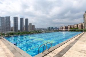 Πισίνα στο ή κοντά στο Huizhou Faithland Atin Hotel