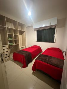 Una cama o camas en una habitación de Casa com piscina no Aracagy 2 km da praia