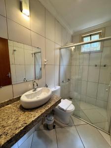 Et badeværelse på Imperial Cidade Smart Suítes