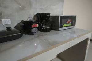 Kuchyň nebo kuchyňský kout v ubytování KEYTRI Rooms