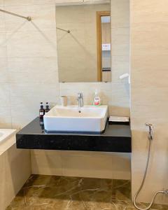 Un baño de Seaview Quy Nhon apt FLC 25 fotos más