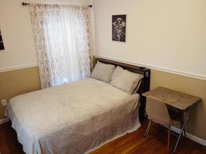 Ένα ή περισσότερα κρεβάτια σε δωμάτιο στο Northside