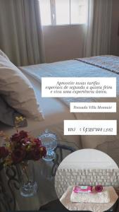 Ένα ή περισσότερα κρεβάτια σε δωμάτιο στο Pousada Café Villa Monnaié