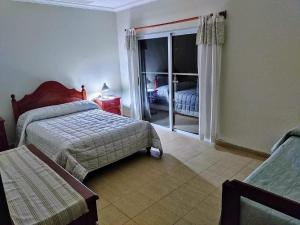 En eller flere senge i et værelse på La Juana