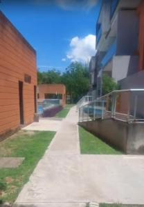 an empty sidewalk next to a building at Villa Lastenia 2 in San Salvador de Jujuy