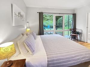 Ένα ή περισσότερα κρεβάτια σε δωμάτιο στο Tessies Studio