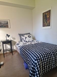 Postel nebo postele na pokoji v ubytování Säynätsalo Town Hall + 26 fotografií