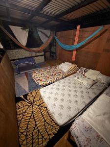 Ένα ή περισσότερα κρεβάτια σε δωμάτιο στο Lola Sayong Xanti 'Silong