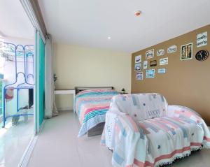 En eller flere senge i et værelse på Bangsaray Beach Condo B620 บางเสร่ บีช + 8 billeder