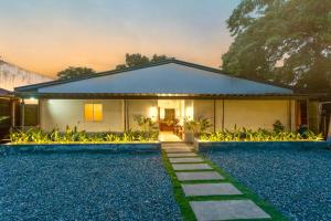 Zahrada ubytování Villa Daluyon Vigan with Jacuzzi and Outdoor Cinema 5 Mins to Crisologo