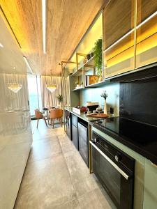 Køkken eller tekøkken på New Suite 14 Alto Luxo Beira Mar